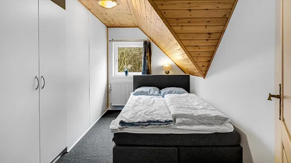 Schlafzimmer in Poolhus Brande