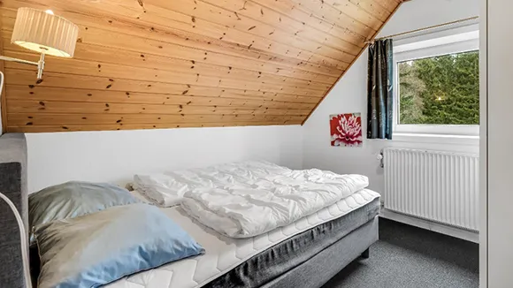 Schlafzimmer in Poolhus Brande