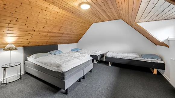 Schlafzimmer in Poolhus Brande