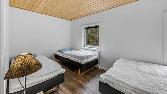 Schlafzimmer in Poolhus Brande