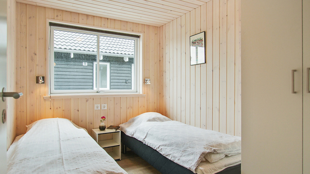 Schlafzimmer in Ostsee Poolhaus