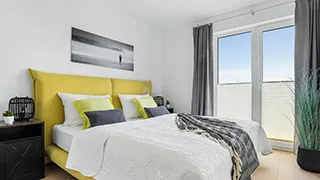 Schlafzimmer in Wohnung Bully