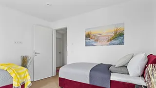 Schlafzimmer in Weitblick-Wohnung