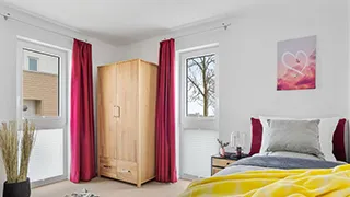 Schlafzimmer in Weitblick-Wohnung