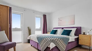 Schlafzimmer in Weitblick-Wohnung