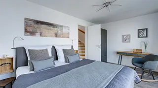 Schlafzimmer in Haus mit Strandkorb Idyll