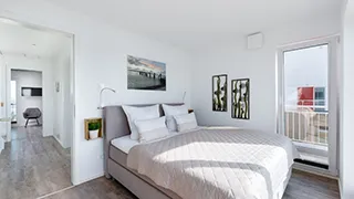 Schlafzimmer in Haus mit Strandkorb Idyll
